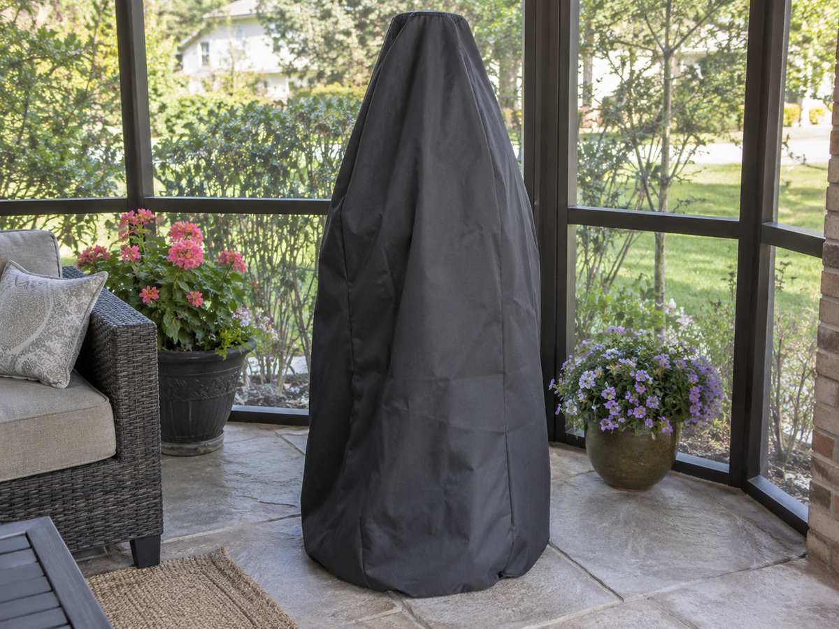Charcoal custom cover over an outdoor fountain beside patio seating